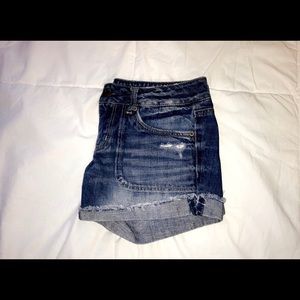 slightly ripped jean shorts.